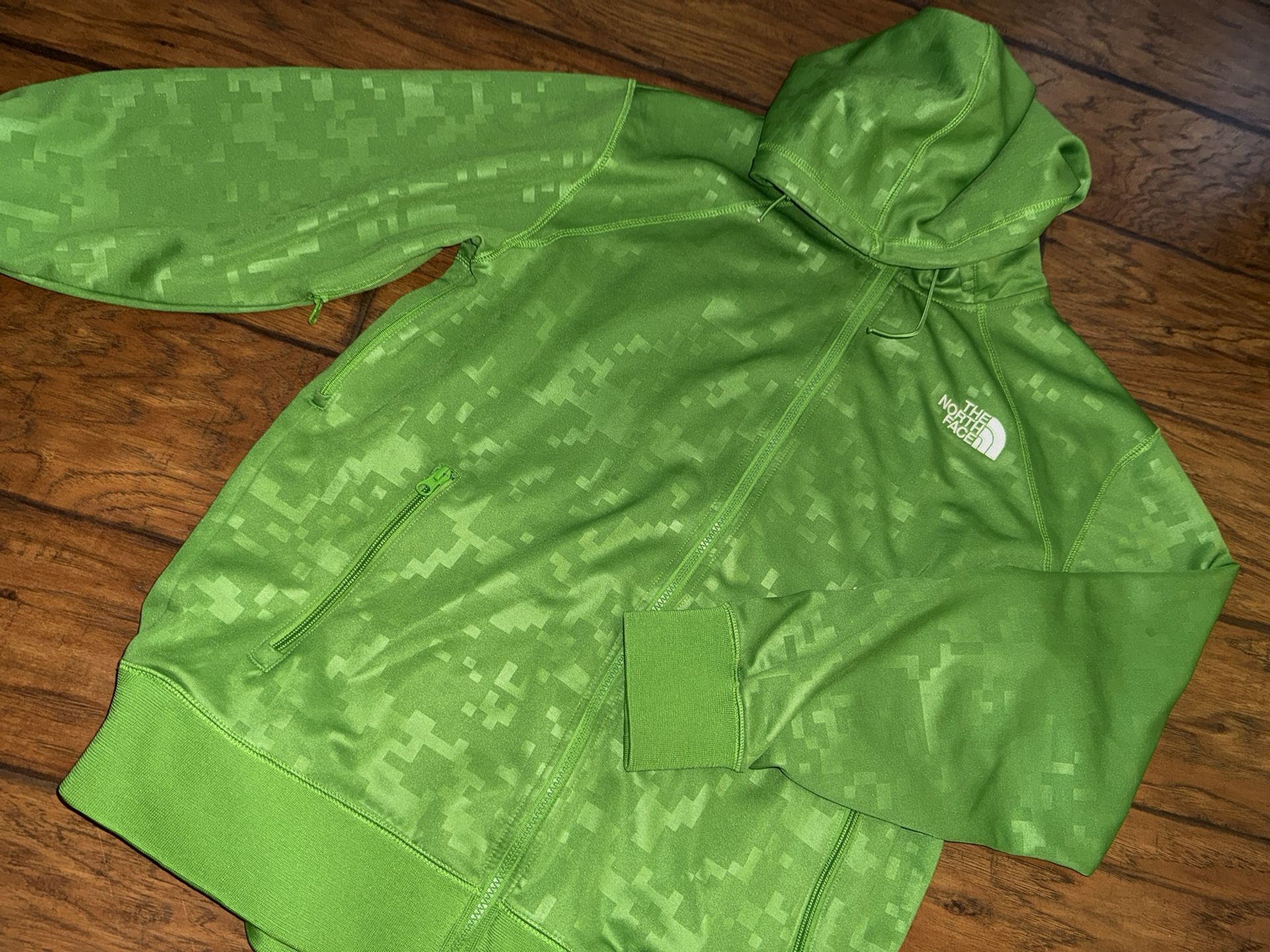 The North Face Green full-zip hoodie with a pixelated pattern Large on tag
