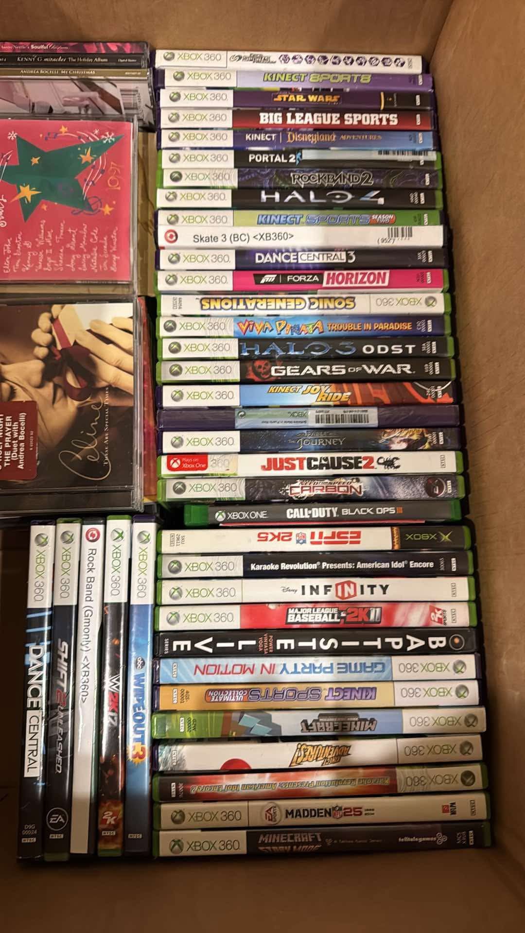 Xbox 360 And Box Of Games
