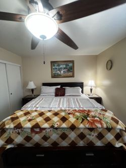 King size bed- used for less than 7 months with nightstands and dresser