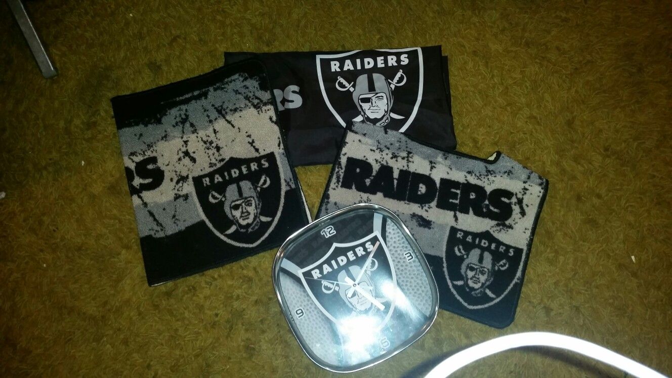 I have this raiders bathroom stuff. It's in really good shape almost brand new. There's 2 rugs, a shower curtain, and a clock.