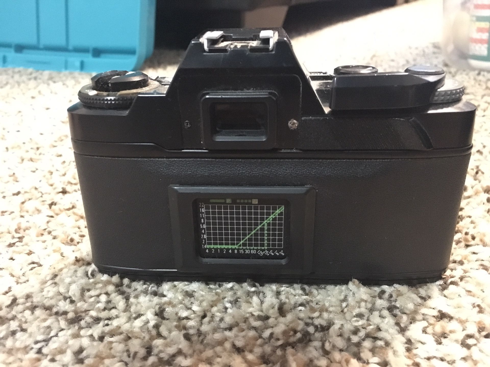Ricoh film camera with: Zoom lens, 1 film,Bag, flash, and extra lens