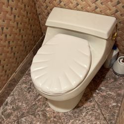 White Kohler One Piece Round Toilet