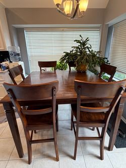 Wood table and 6 chairs