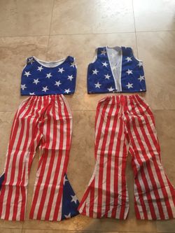 Patriotic heroes 2 costumes for boy and girl., size small.2 sets. Each set includes 1 top and 1 pants.