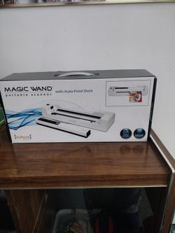 Magic Wand VuPoint solutions portable scanner.