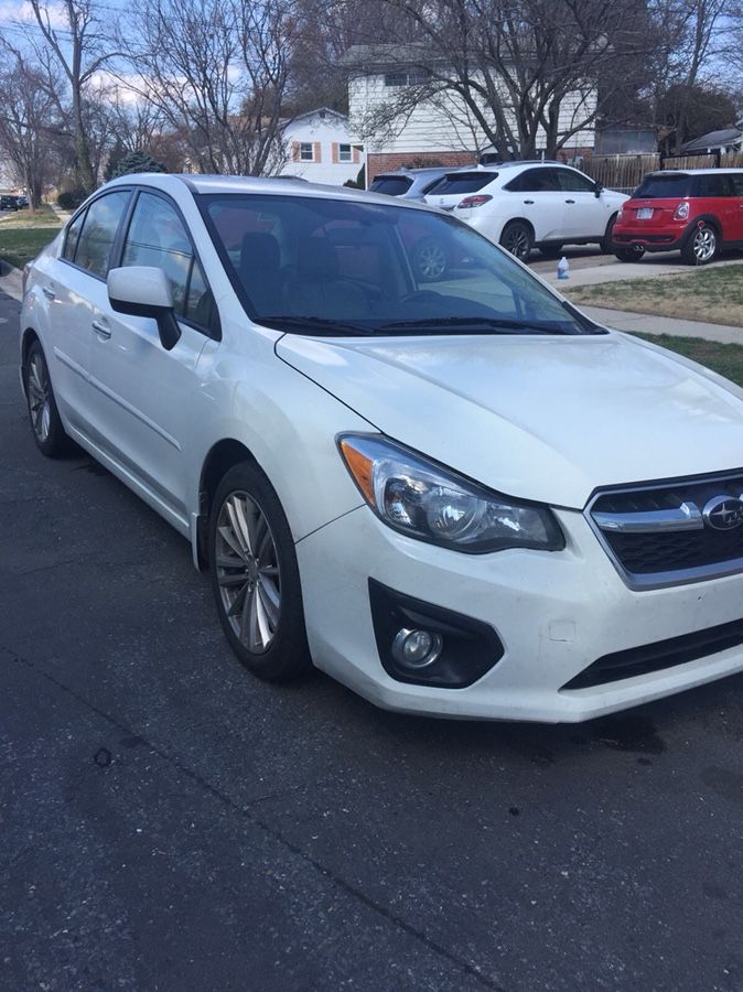 2014 Subaru Impreza premium edition AWD 68k