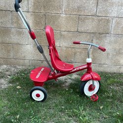 Red Radio Flyer Steer and Stroll Tricycle