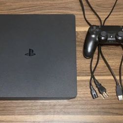PS4 Consolole With A Controller