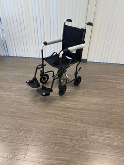 $69 / Drive Medical transport wheelchair / folds compact / 250 pound capacity