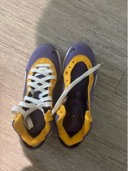 Purple and yellow Jordan Nike jordans boys size 5.5