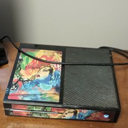 Xbox One, All Plugs, Just No Controller.. Runs Very Good And You Could Test Out..