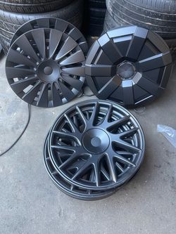Tesla hubcaps new $100 each set free installation