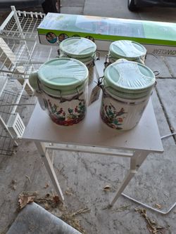Pioneer Women Cannisters with spoons