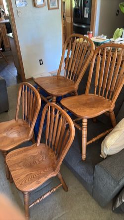 4 Oak dining chairs.