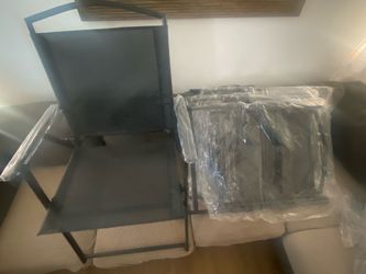 4 New folding chairs black