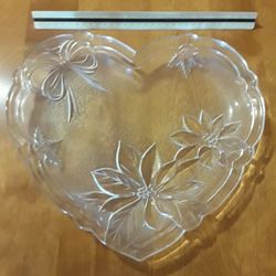 Heart shaped glass plate with christmas holly and poinsettia pattrrn