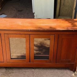 Tv stand that needs some TLC it’s 25 inches tall 53 inches wide and 16 inches deep