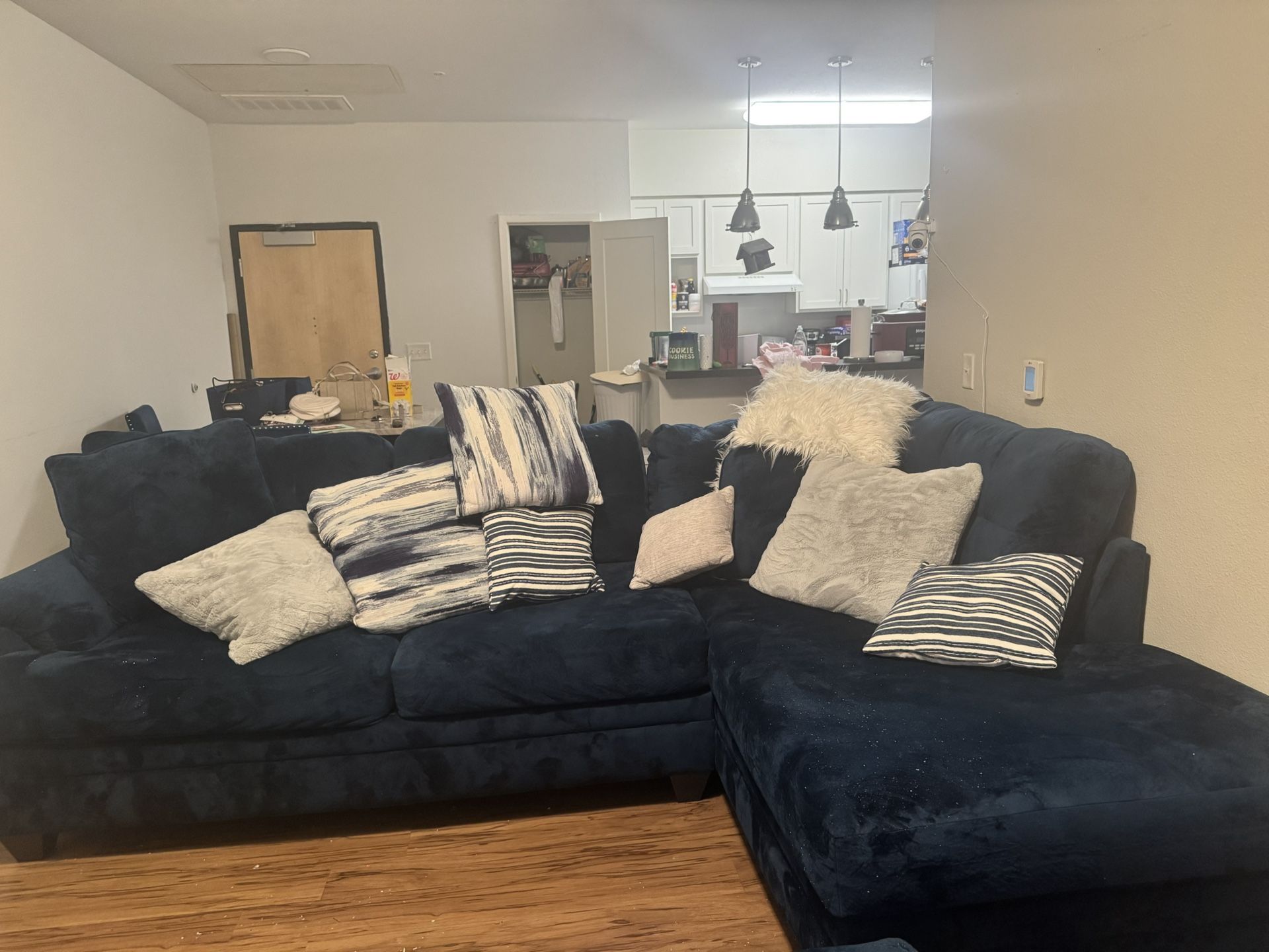 Sectional With Swivel Chair
