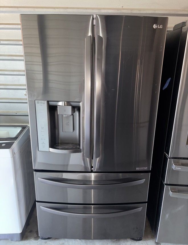 LG Dark Stainless Steel Refrigerator And Freezer
