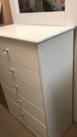White compressed wood dresser w/ diamond knobs