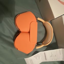 Orange AirPod Pro Maxes 