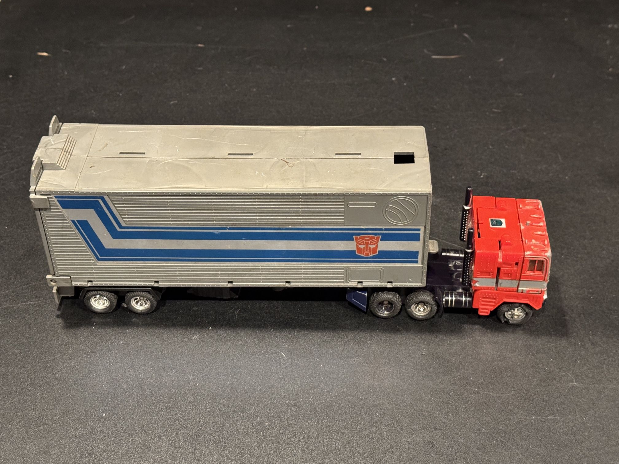 Transformers G1 Vintage Leader Optimus Prime. 1 Takara Japan. Age & play wear. Tires rough. Semi smokestacks loose. Claw broken in trailer. St
