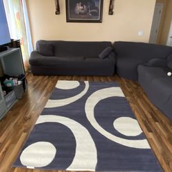 HANDMADE WOOLEN RUG.    SIZE  5 X 8