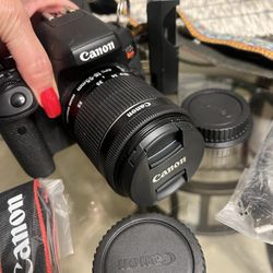 Canon camera with accessories and case