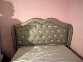 Queen box spring and headboard.