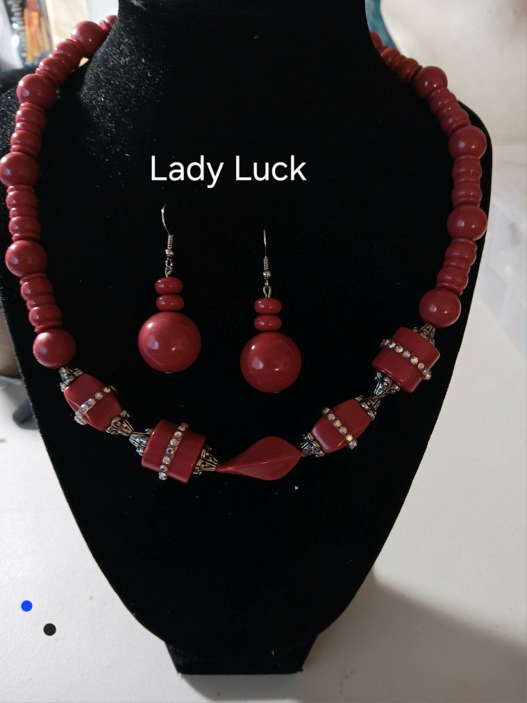 Dark Rose necklace bracelet and earring set.