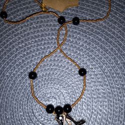 A Day In The Life Of A Woman Gold & Black Seed Bead Necklace With Spiked Heel & Converse 