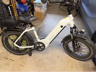 MagiCycle Ocelot Electric Bike 20 inch fat tire step thru