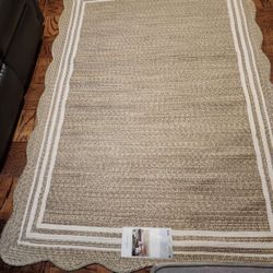 Brand new 5 x 7 Indian made braided area rug. Indoor or outdoor. 