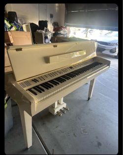White Upright Piano with Three Pedals