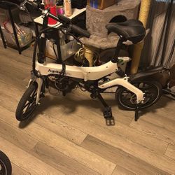 I Have 2  For Sale Jupiter Bicycles  Its White And Have A Head Light 