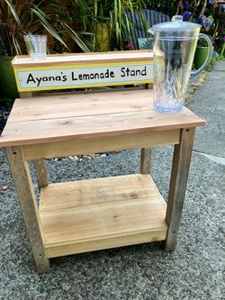 Sidewalk sale table with your kiddos name