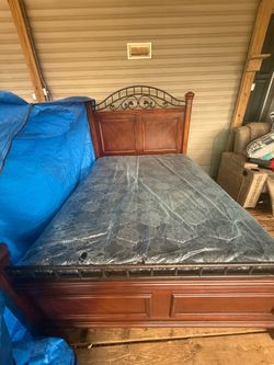 Queen size bed frame with mattress and boxspring
