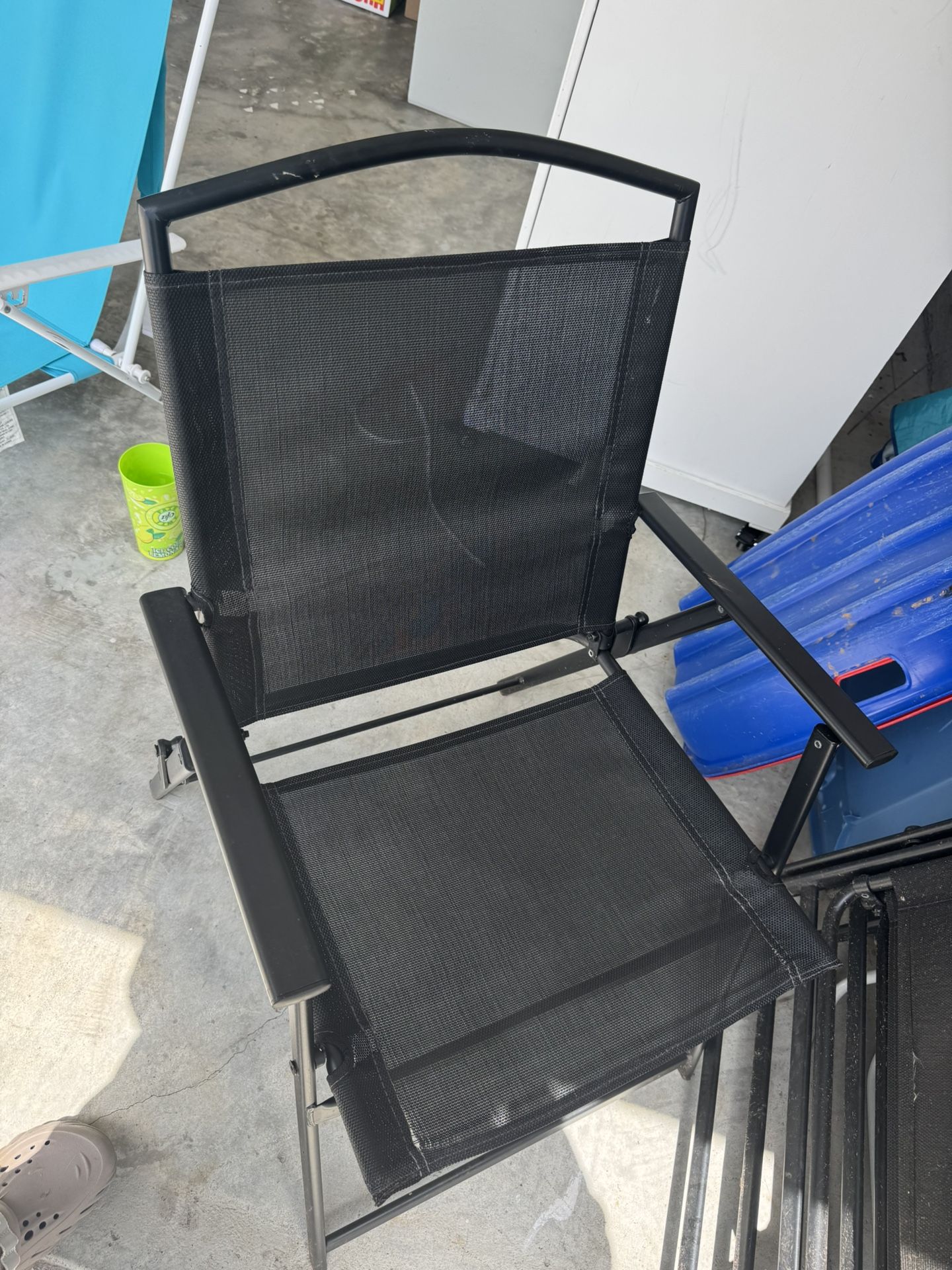 4 Black Folding Chairs 