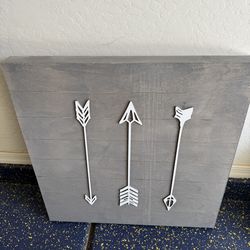 Grey wood arrow wall art