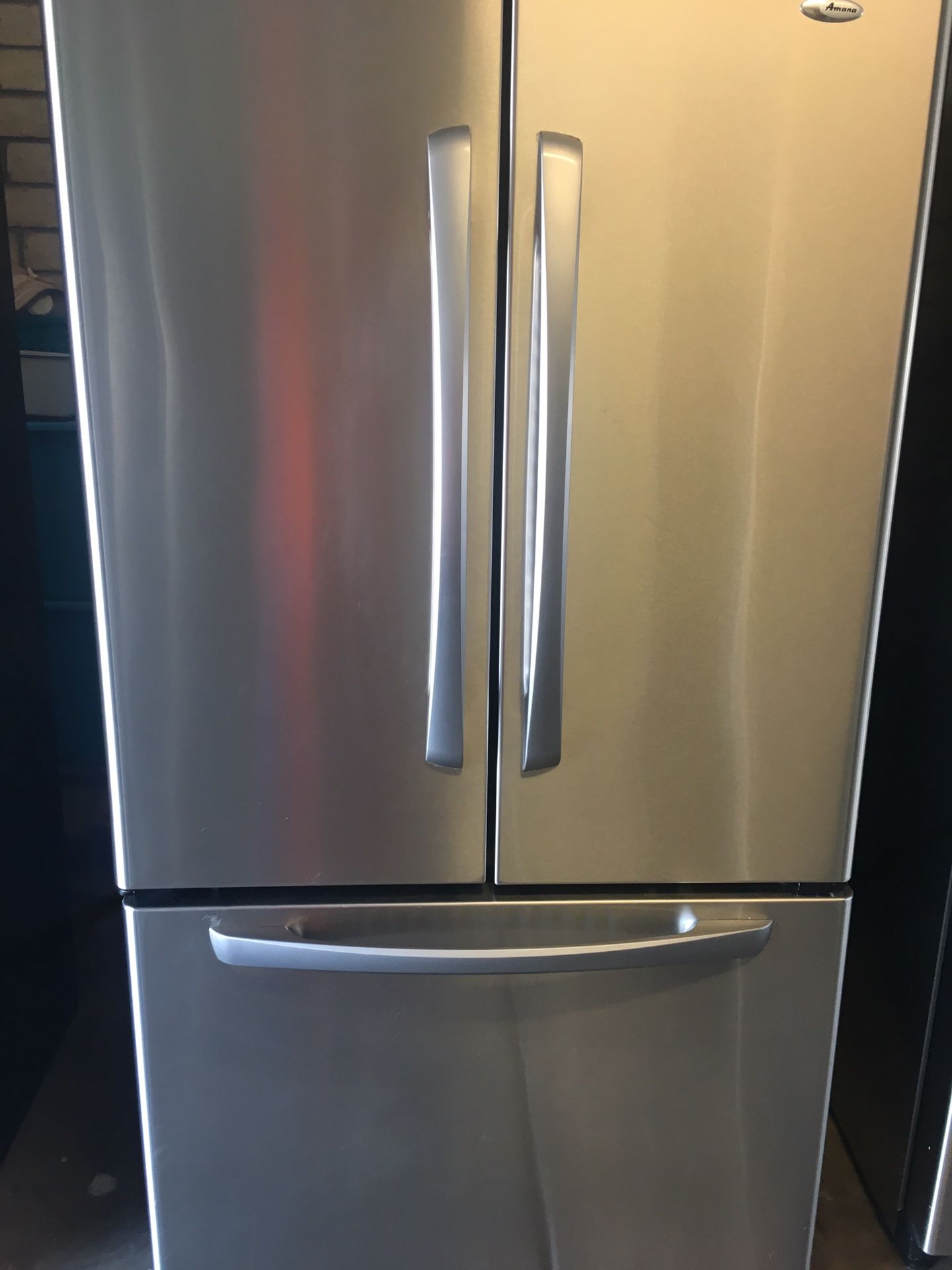Stainless Steel Amana French Door water inside the fridge ice maker on