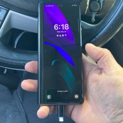 Samsung Z Fold 2 5g Phone Unlocked Clean Phone no scratches no dents. It has screen protector on it. That’s why it might look scuffed up, but it’s not