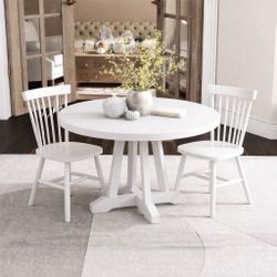 New In box Dining Table And Chairs