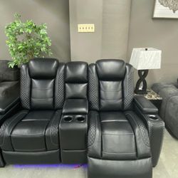 Ashley loveseat reclining with blue light $1,499