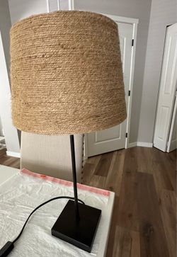 Black tall skinny modern lamp with jute twine shade