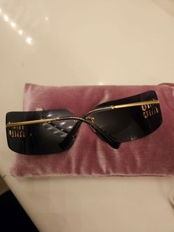 Miu Miu Glass