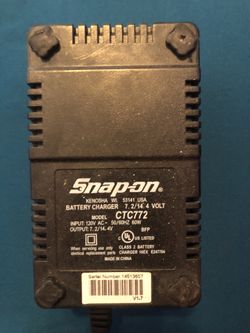 Snap on battery charger