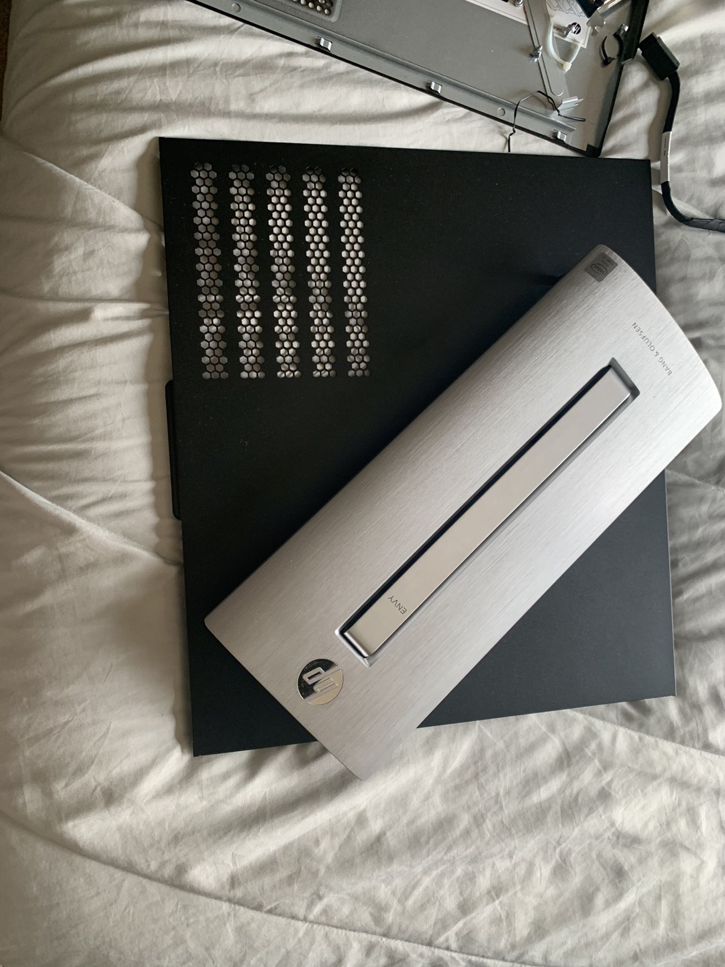 Literally random computer parts. Computer case, graphics card, fans, power supply, mother board, and processor.