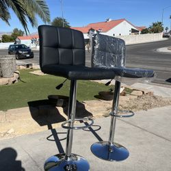 Brand New Set of 2 modern black leather swivel bar stools, height adjustable