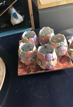 Hollowin holiday plate with 5 colorful candles.