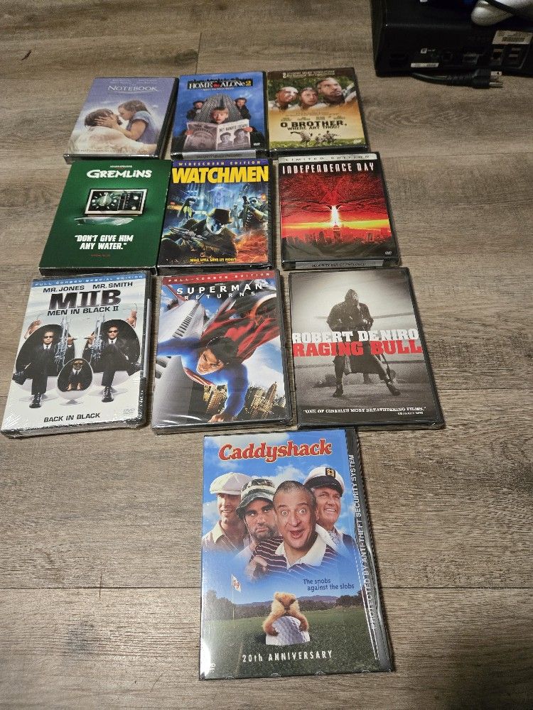 Selling Several Unpened DVDs $2 Each SEE PHOTOS